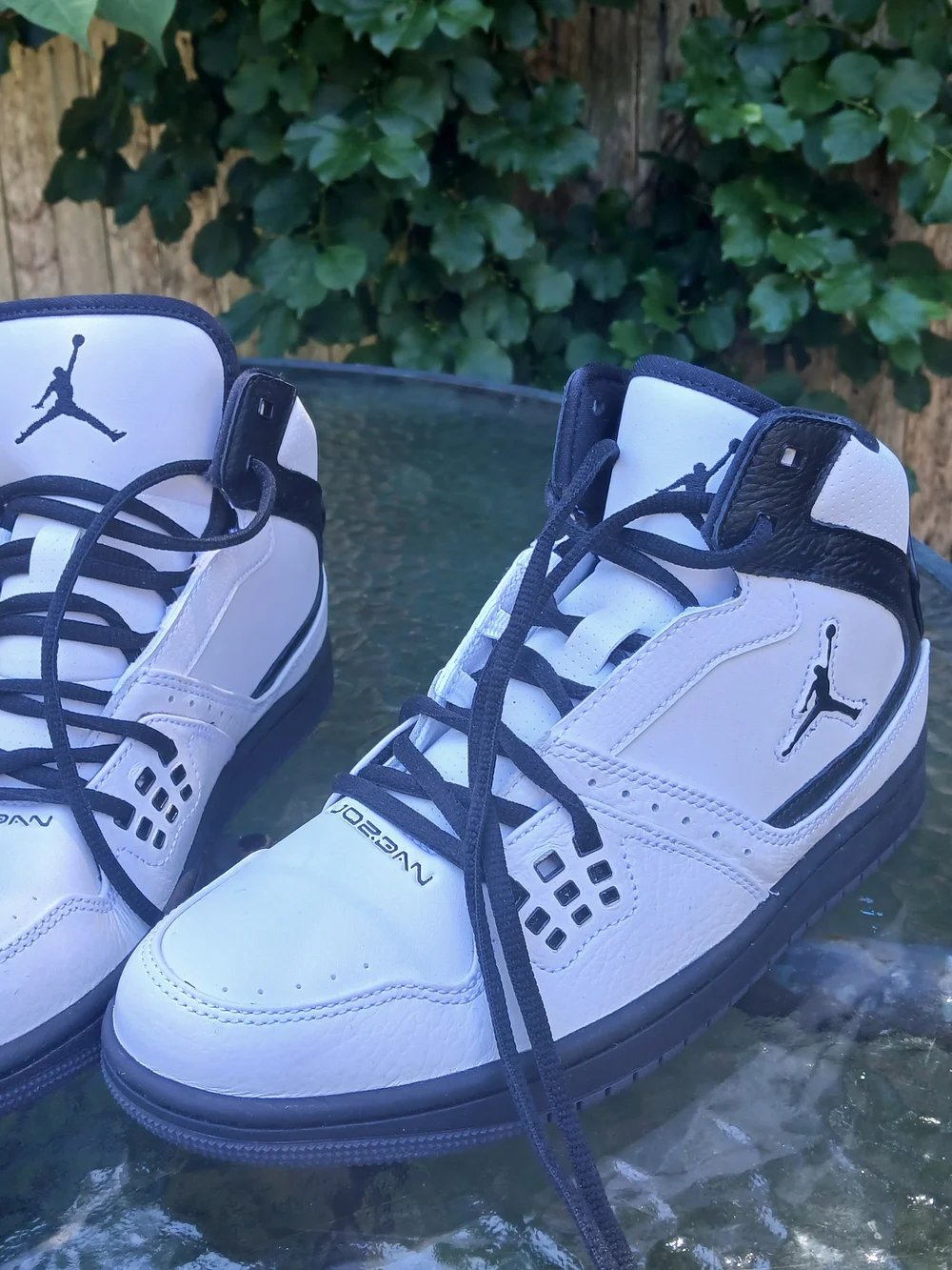 Jordan Men’s White and Black Mid-Top Sneakers with Jumpman Logo